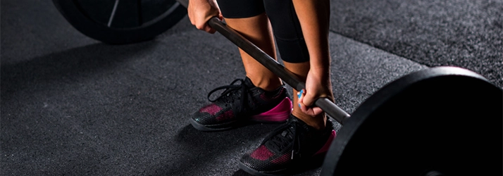 Chiropractic Rock Hill SC Feet Of Woman Lifting Weights